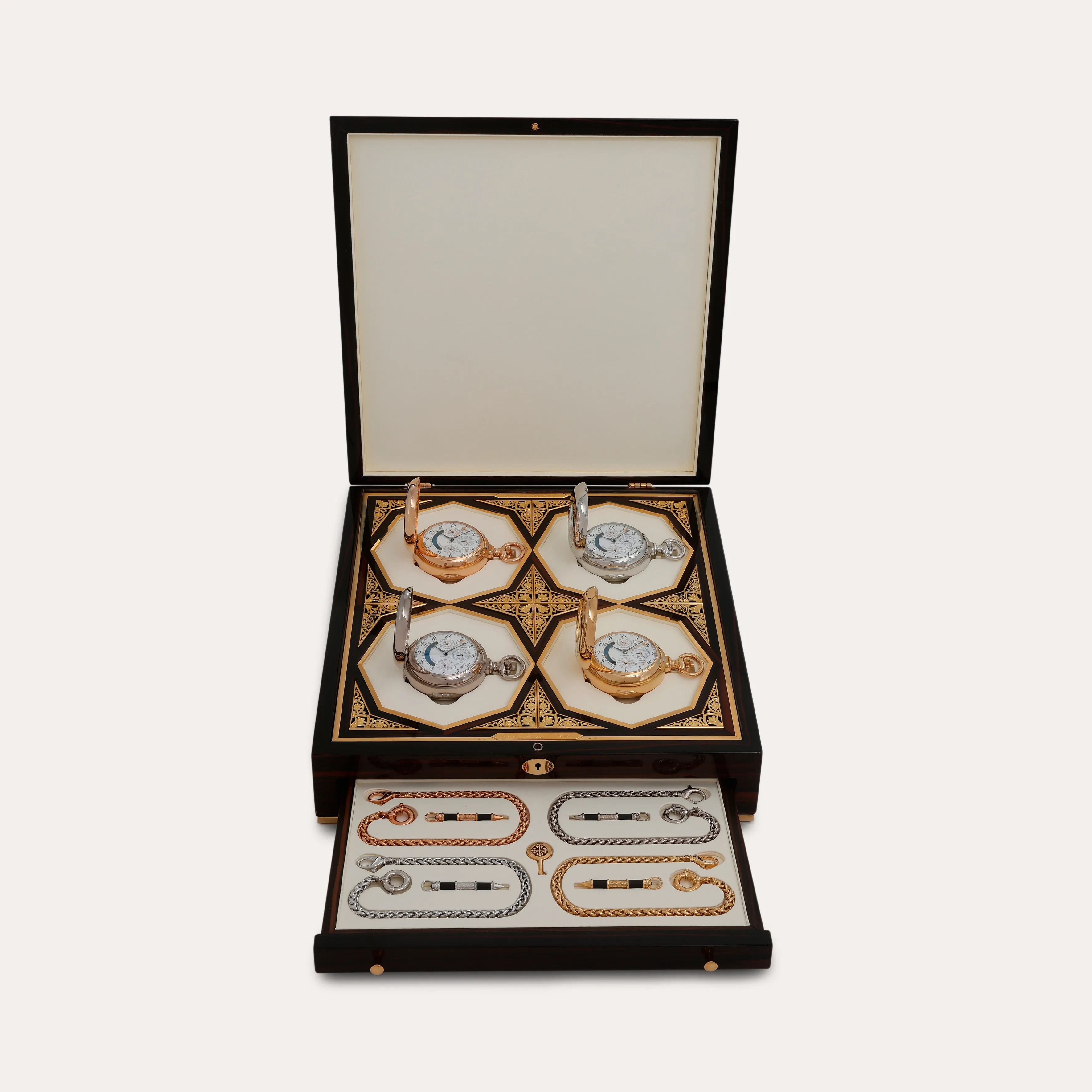 Patek Philippe, An exceptional, highly important and extremely rare set of four yellow gold, pink gold, white gold and platinum double dialled clock watches, estimate �10-20m.webp