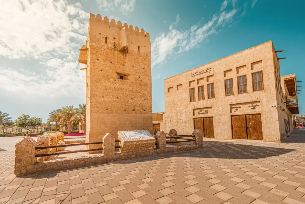 Al Shindagha Museum pavilions — traditional coral stone and gypsum architecture in Dubai Creek Heritage District.webp